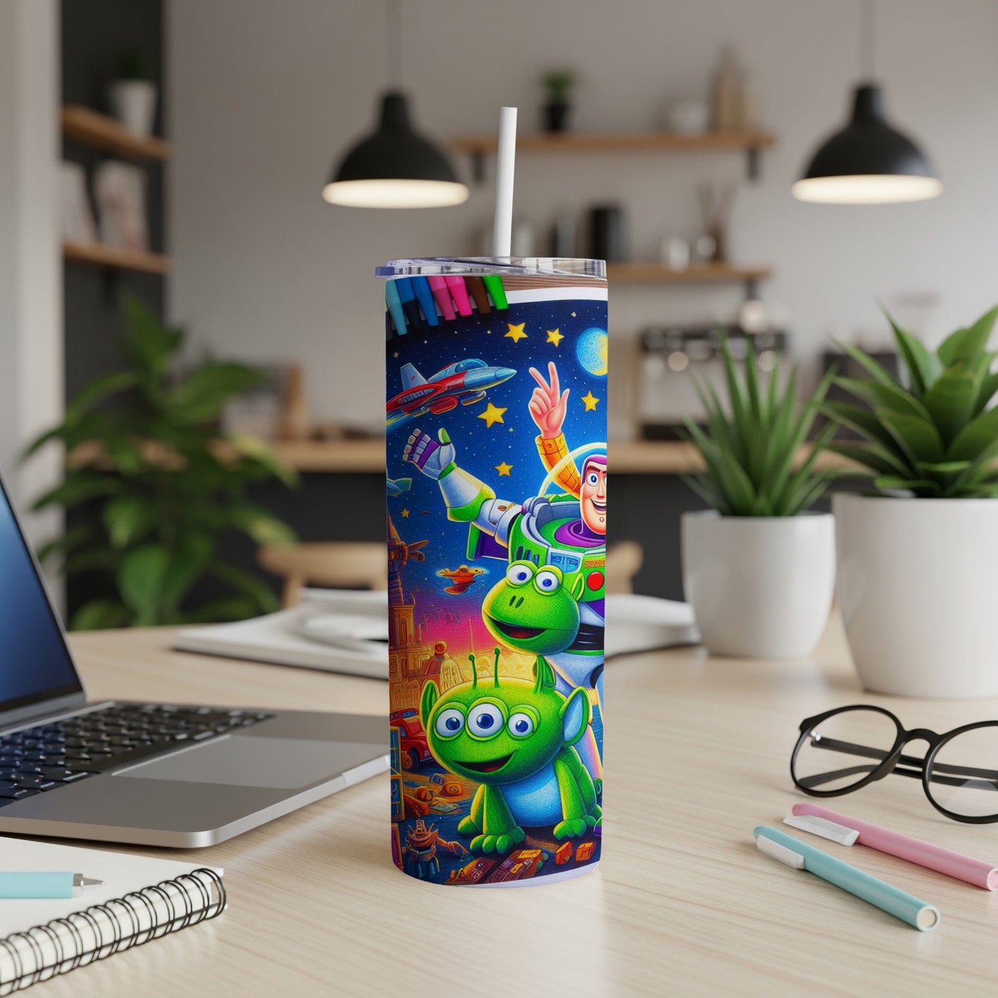 Toy Story characters Buzz Lightyear, Woody, and Alien on a colorful tumbler cup.