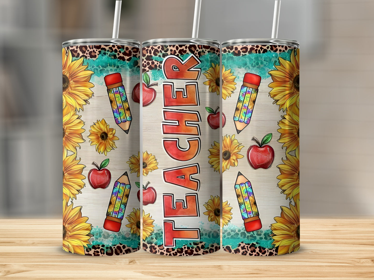 Teacher tumbler with sunflowers, apples, and pencils.
