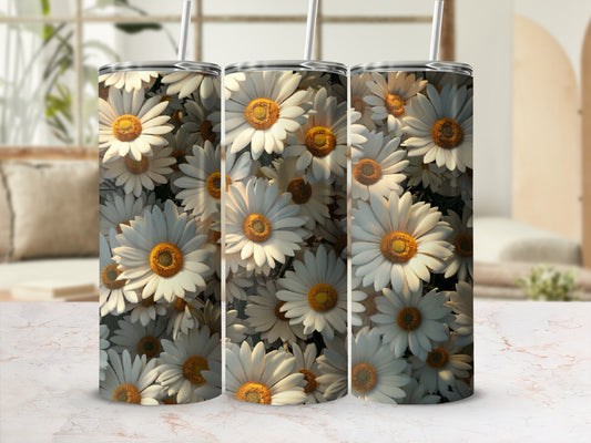 Three tumblers featuring a dense pattern of white daisies with yellow centers.
