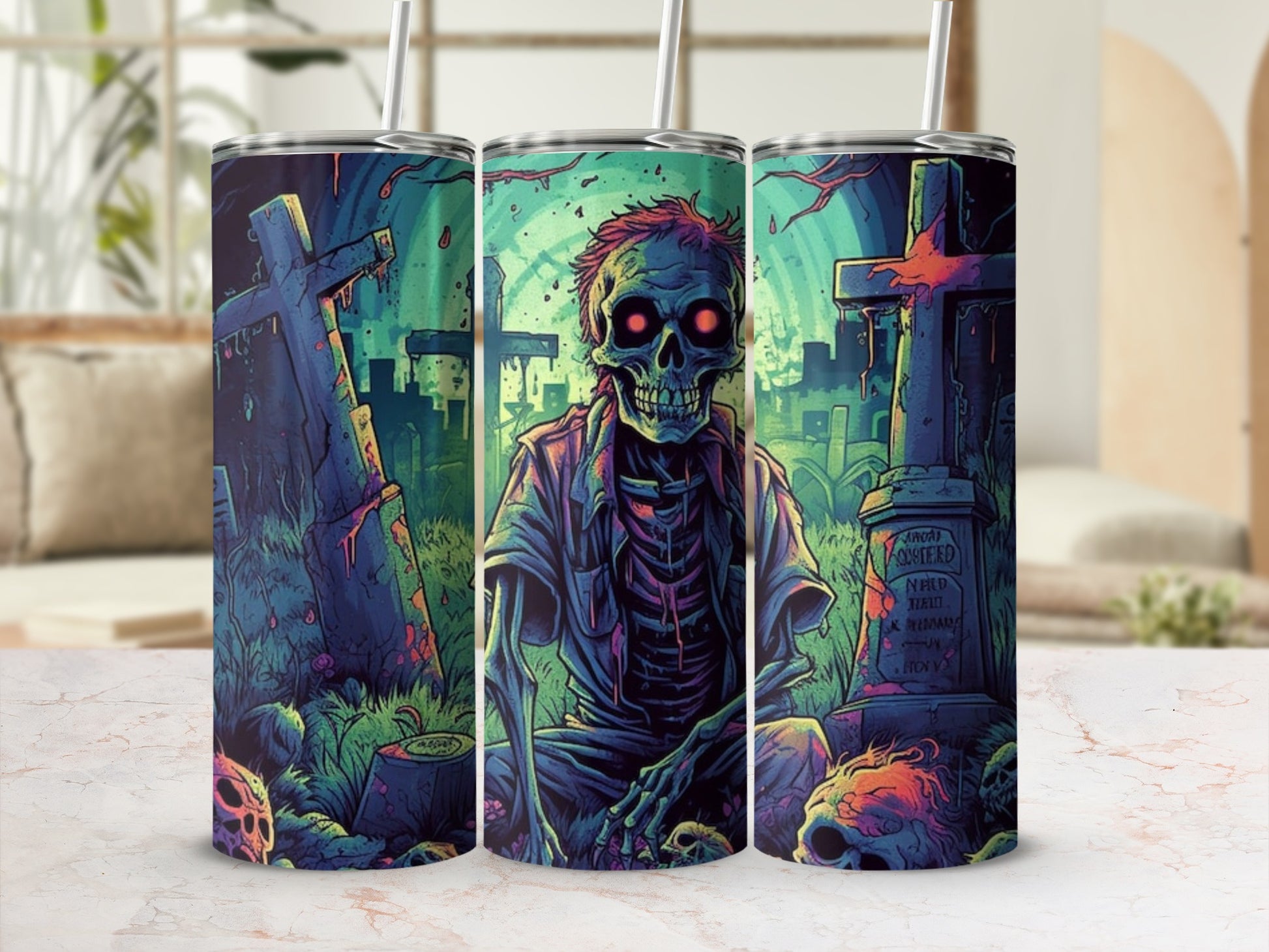 Tumbler with a spooky cemetery scene featuring a zombie, gravestones, and skulls.