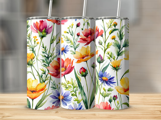 Three tumblers with a vibrant floral watercolor design.