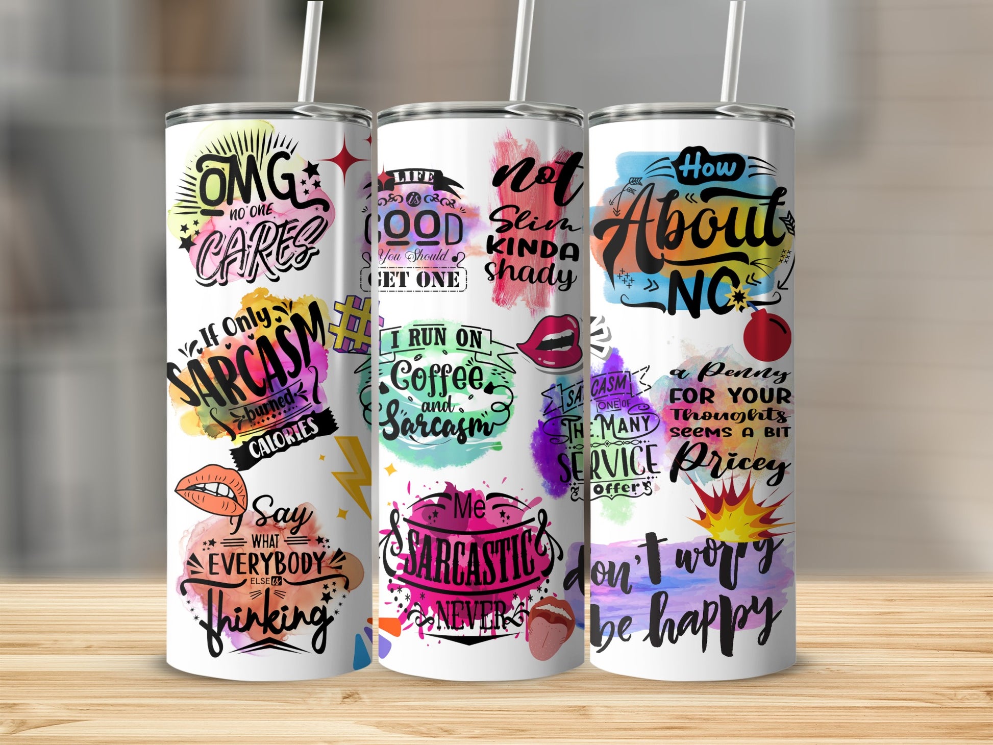 Two tumblers with sarcastic quotes and colorful designs.