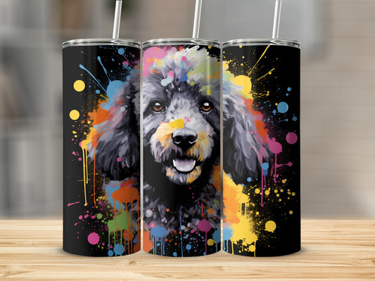 Black poodle portrait with colorful paint splatters on black tumbler.