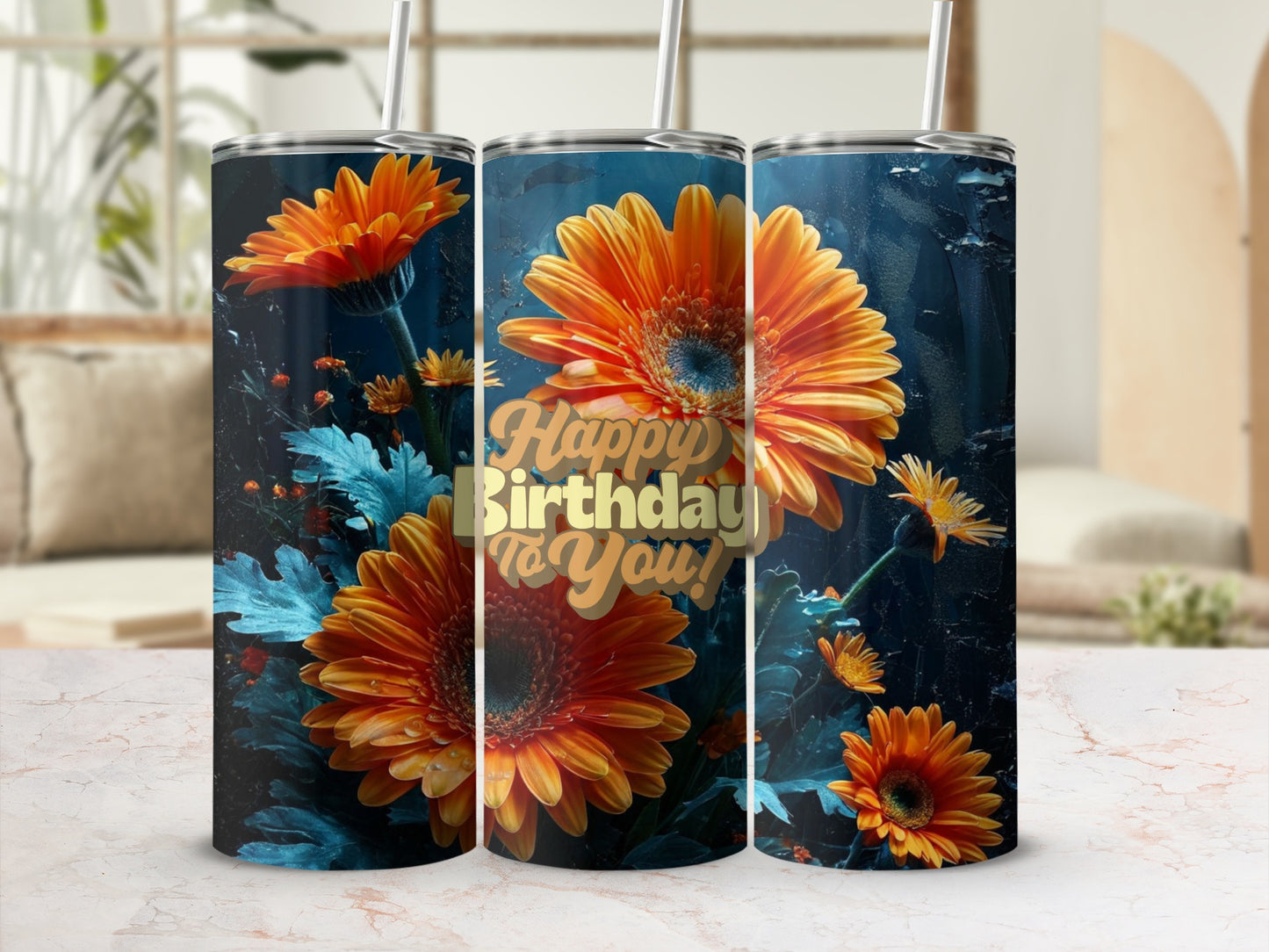 Orange gerbera daisies with "Happy Birthday to You!" text on a tumbler.