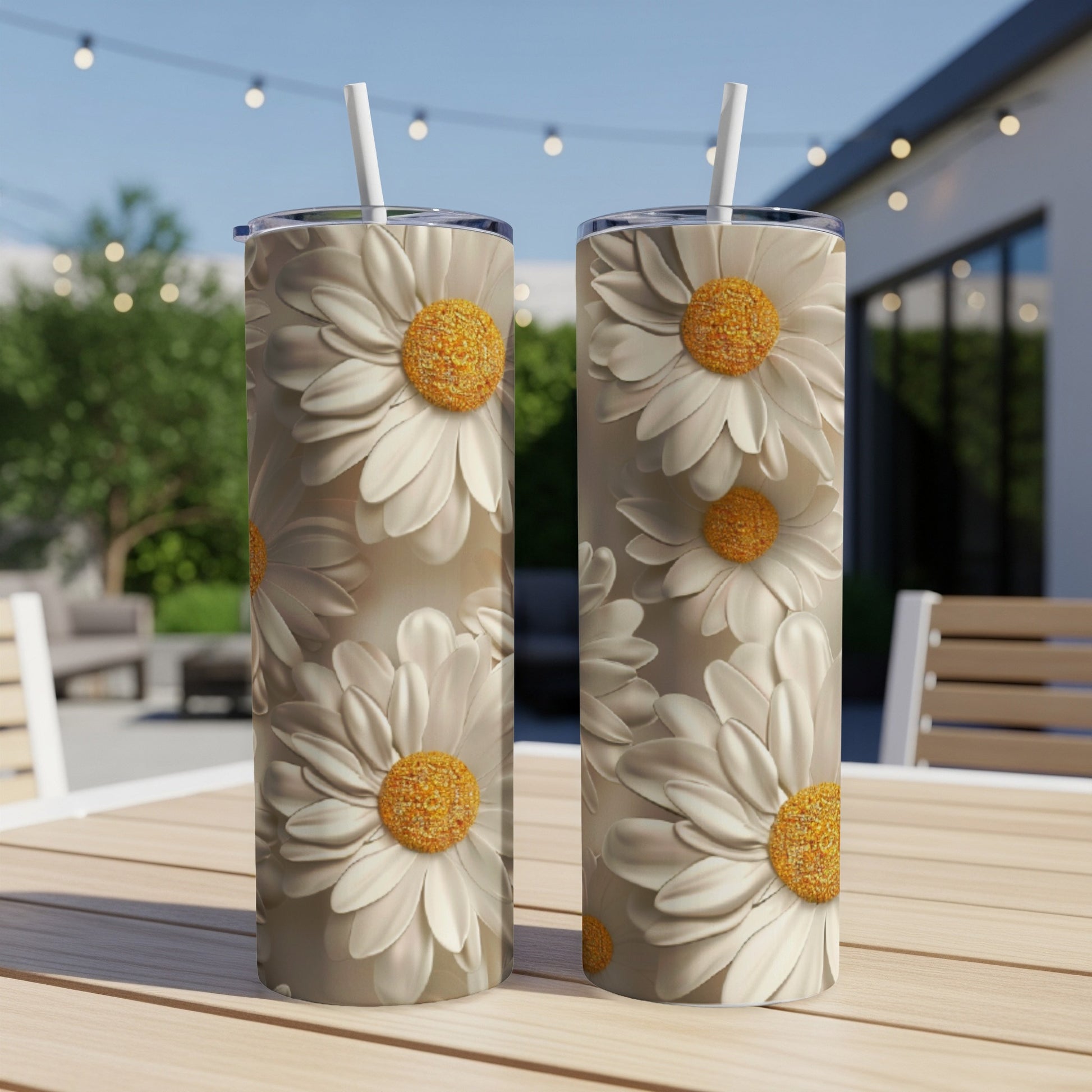 Two white daisy tumblers with yellow centers on a wooden table.