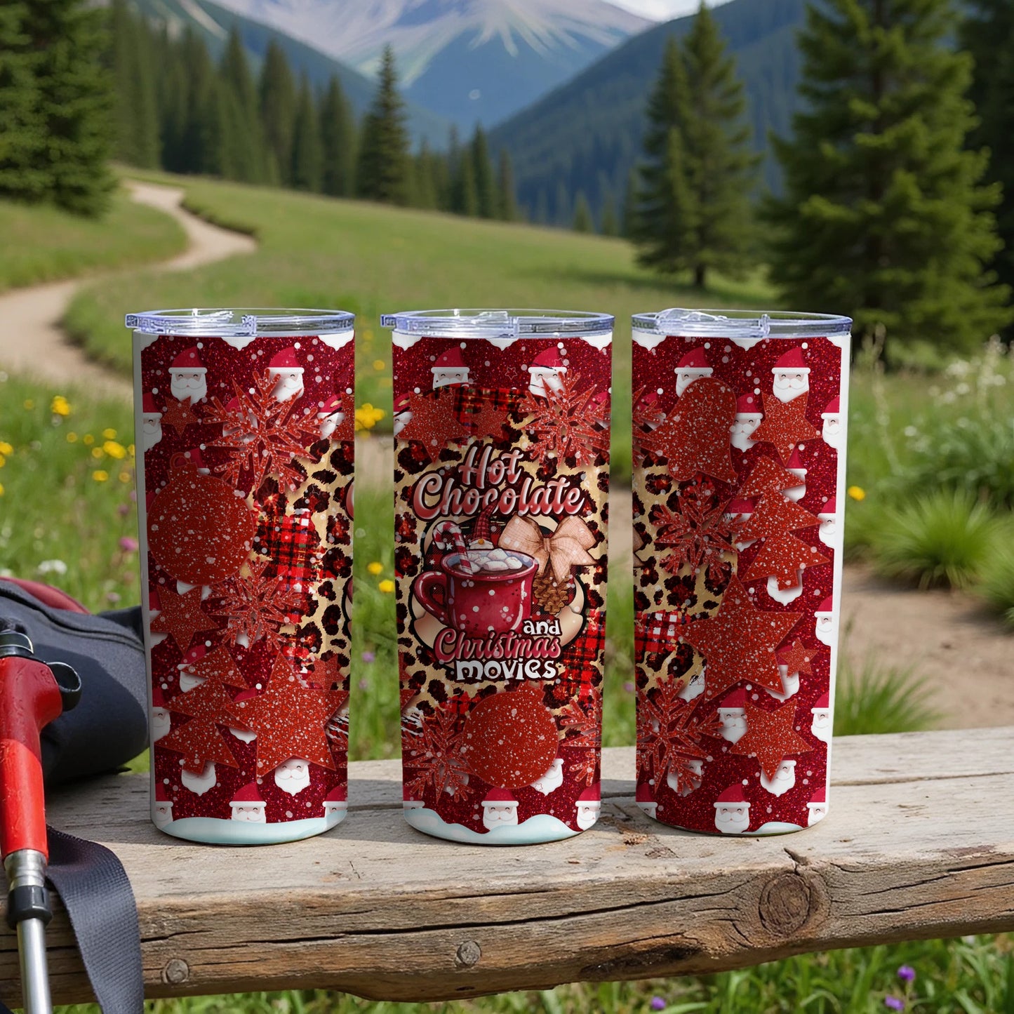 Three tall tumblers with Christmas patterns and "Hot Chocolate and Christmas Movies" text.