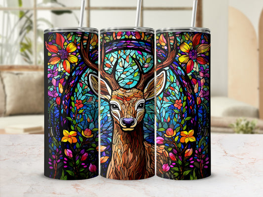 Stained glass tumbler featuring a deer surrounded by colorful flowers and foliage.