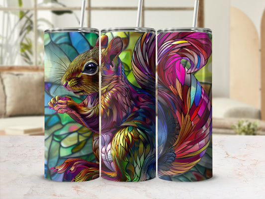 Squirrel stained glass art on a cylindrical tumbler.