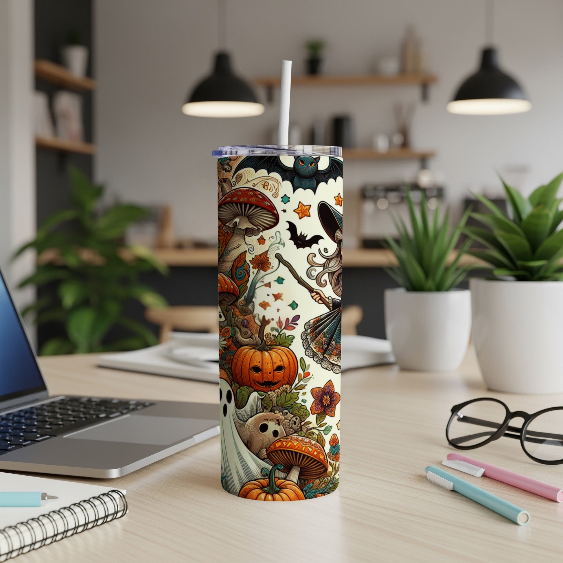 Halloween tumbler with witches, bats, pumpkins, ghosts, and mushrooms.