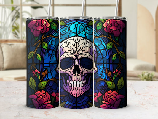 Stained glass skull with roses and vines on a blue background.