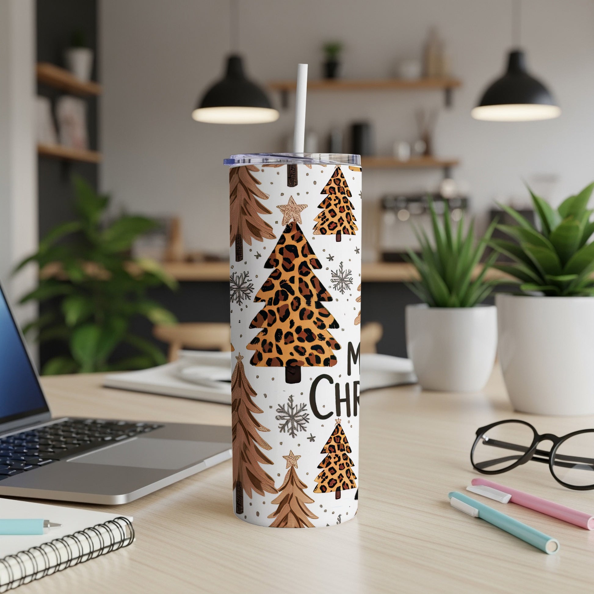 Leopard print and snowflake Christmas tree pattern tumbler with straw.