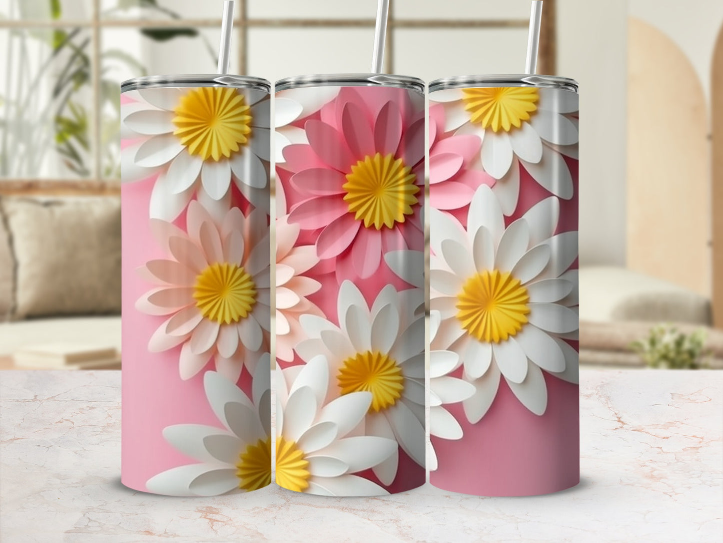 Three tall pink tumblers with white and yellow daisy patterns.