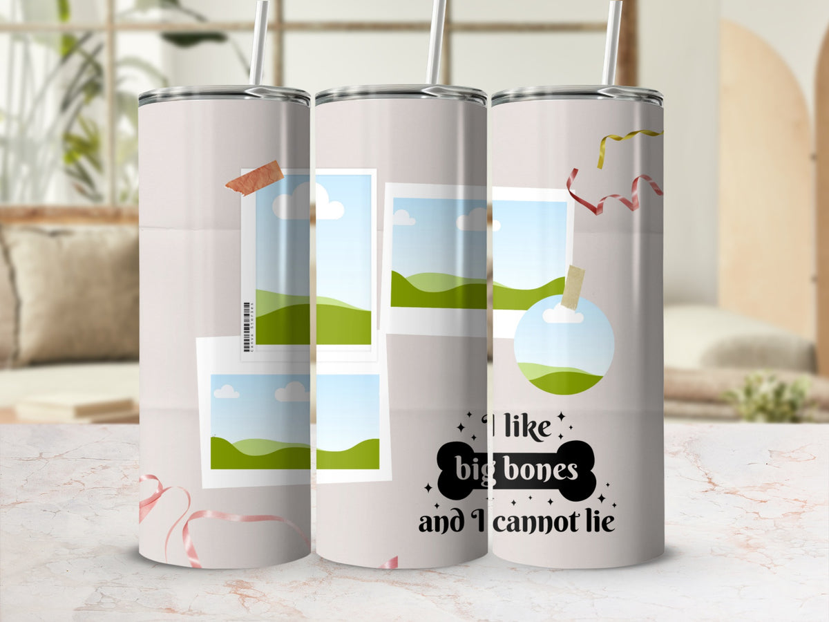 Tumbler with "I like big bones and I cannot lie" text and decorative tape.