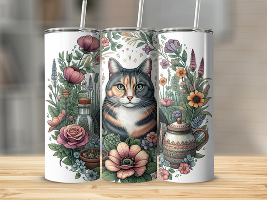 Cat with floral accents and a teapot on a skinny tumbler.