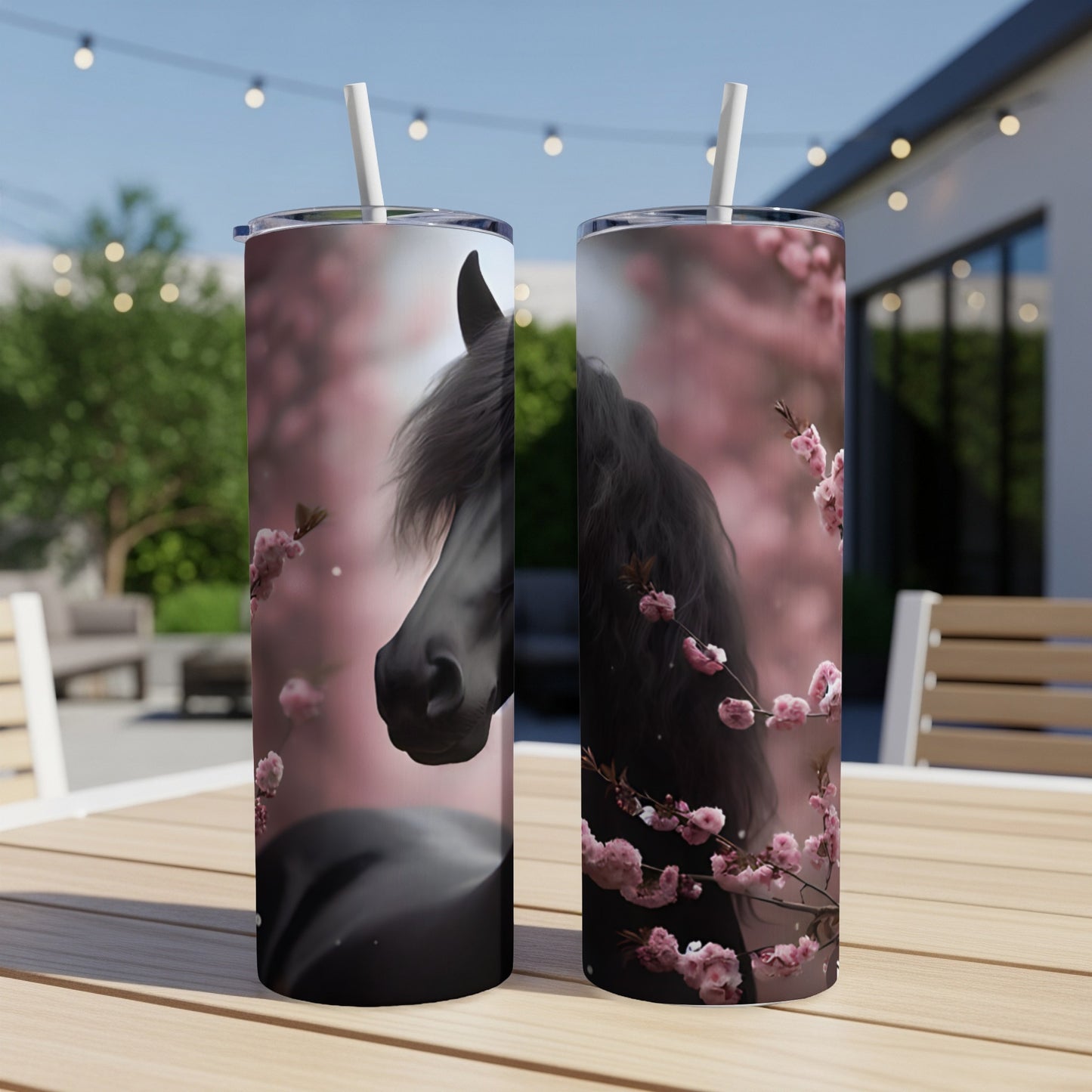 Black horse head with pink blossoms on a slim tumbler.