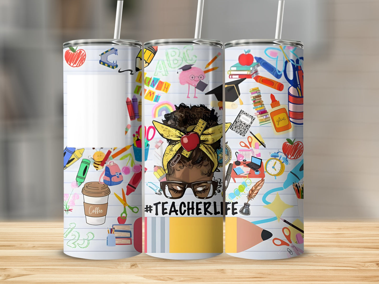 Teacher Life tumbler with school supplies and a woman's messy bun hairstyle.