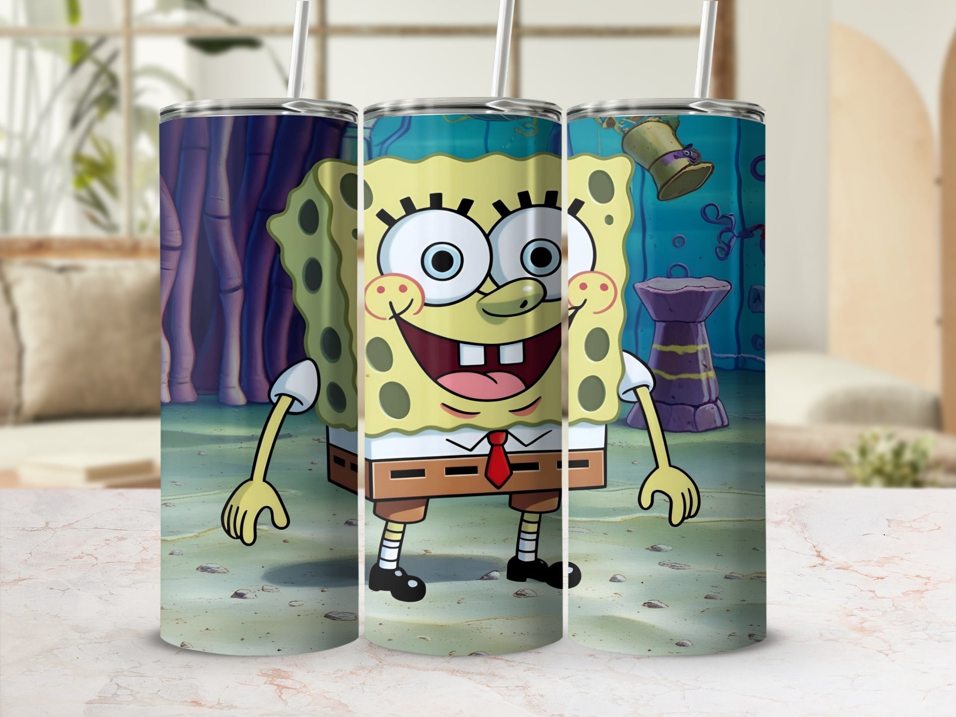 SpongeBob SquarePants tumbler with a white straw and red tie.