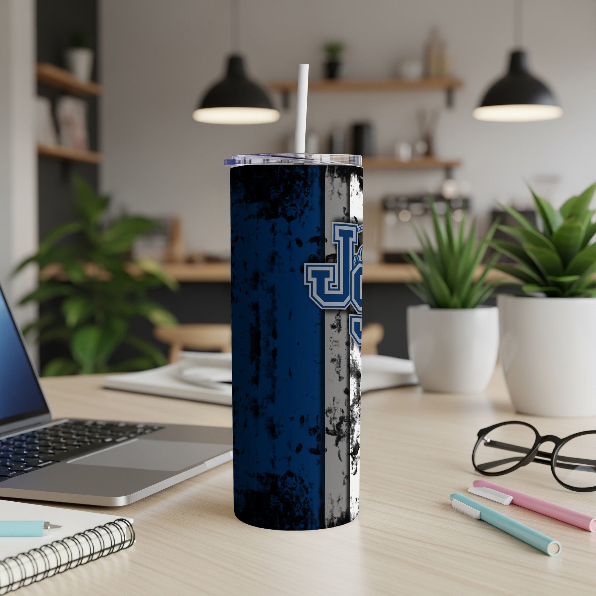 Tall tumbler with blue and white distressed design and "UK" logo.