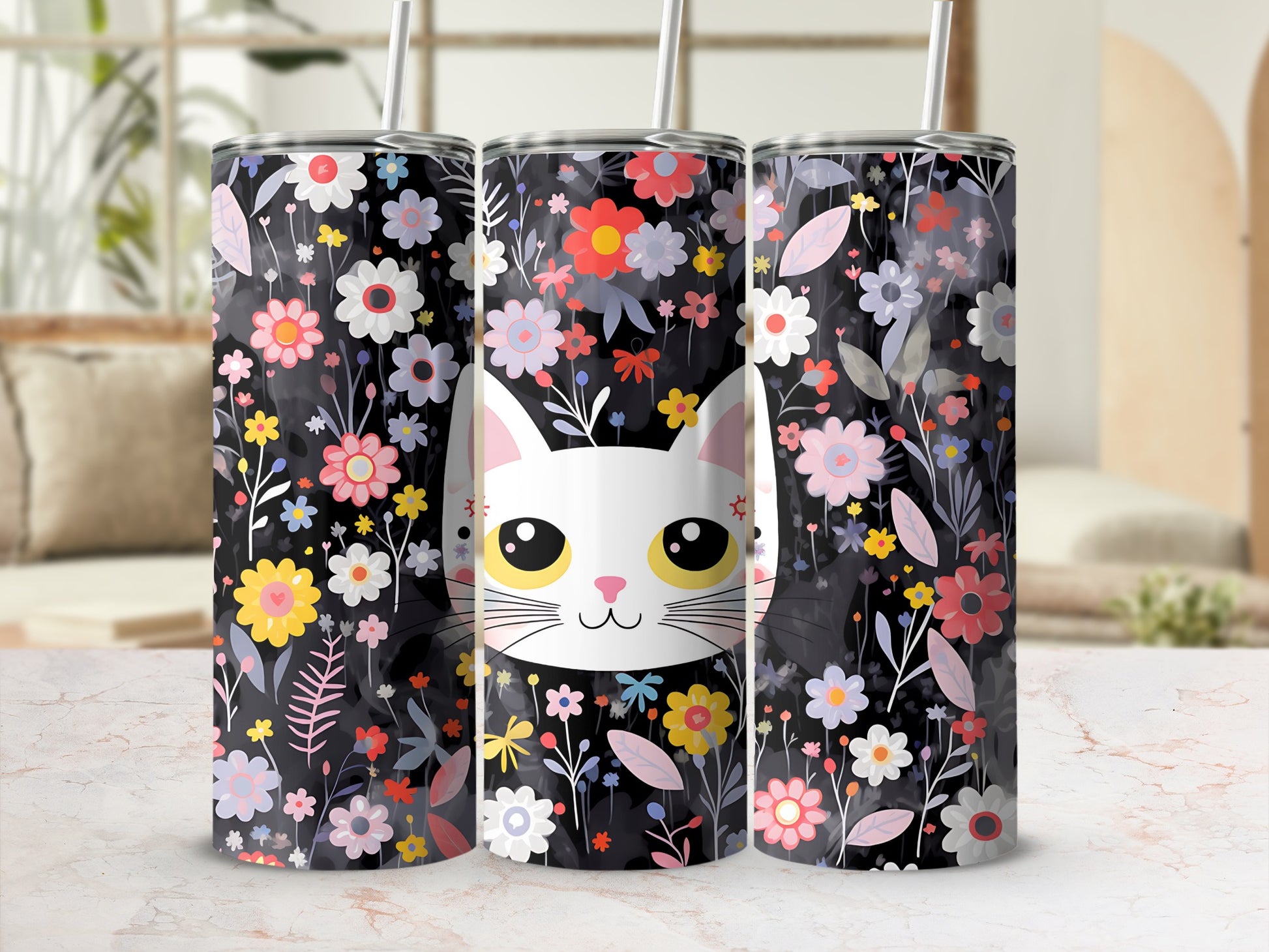 Black tumbler with cute cat face and colorful floral pattern.