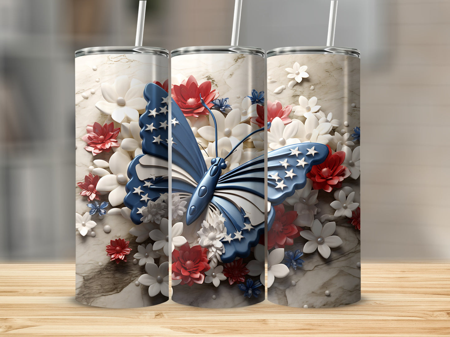 Three tumblers with patriotic butterfly and floral designs.