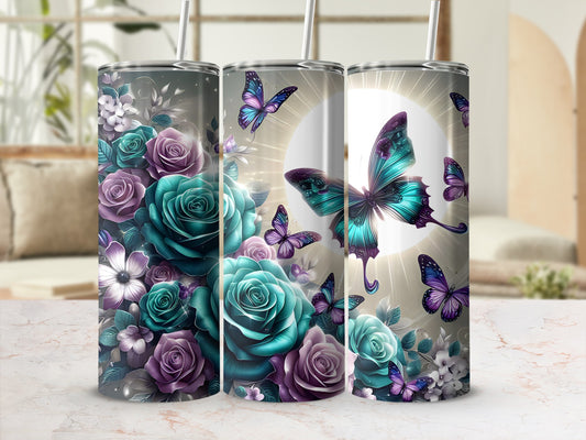 Three tumblers with a floral and butterfly design in teal and purple.
