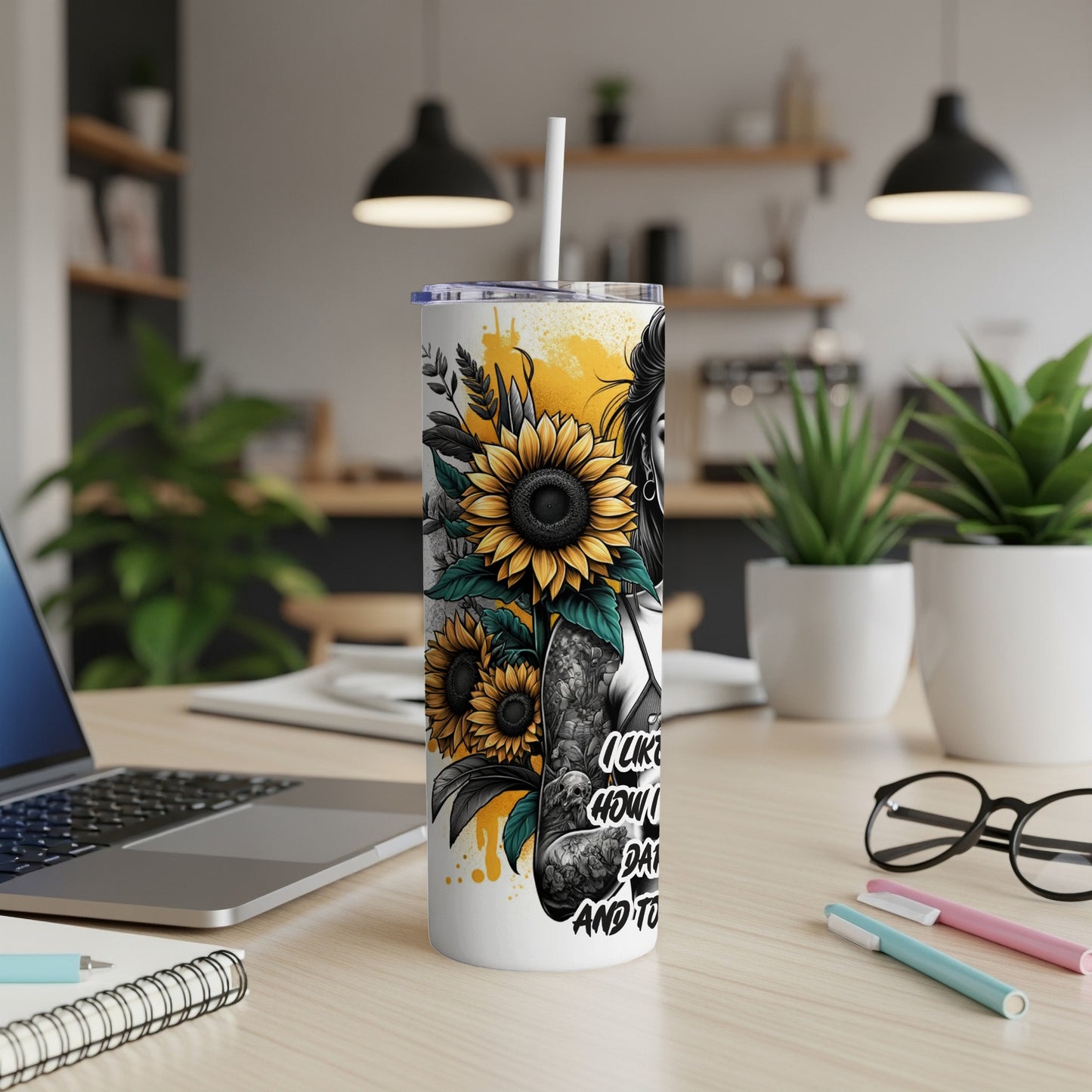 Tall tumbler with sunflowers and a woman's silhouette, text "I like how a day..."