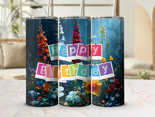Three tumblers with "Happy Birthday" in colorful letters surrounded by flowers.