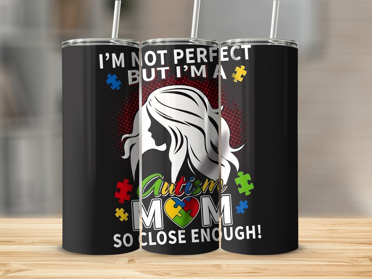 Black tumbler with "Autism Mom So Close Enough" and puzzle pieces.