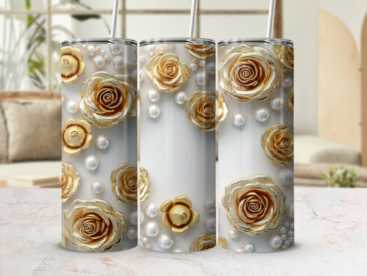 Three tumblers with gold roses and pearl accents on white background.