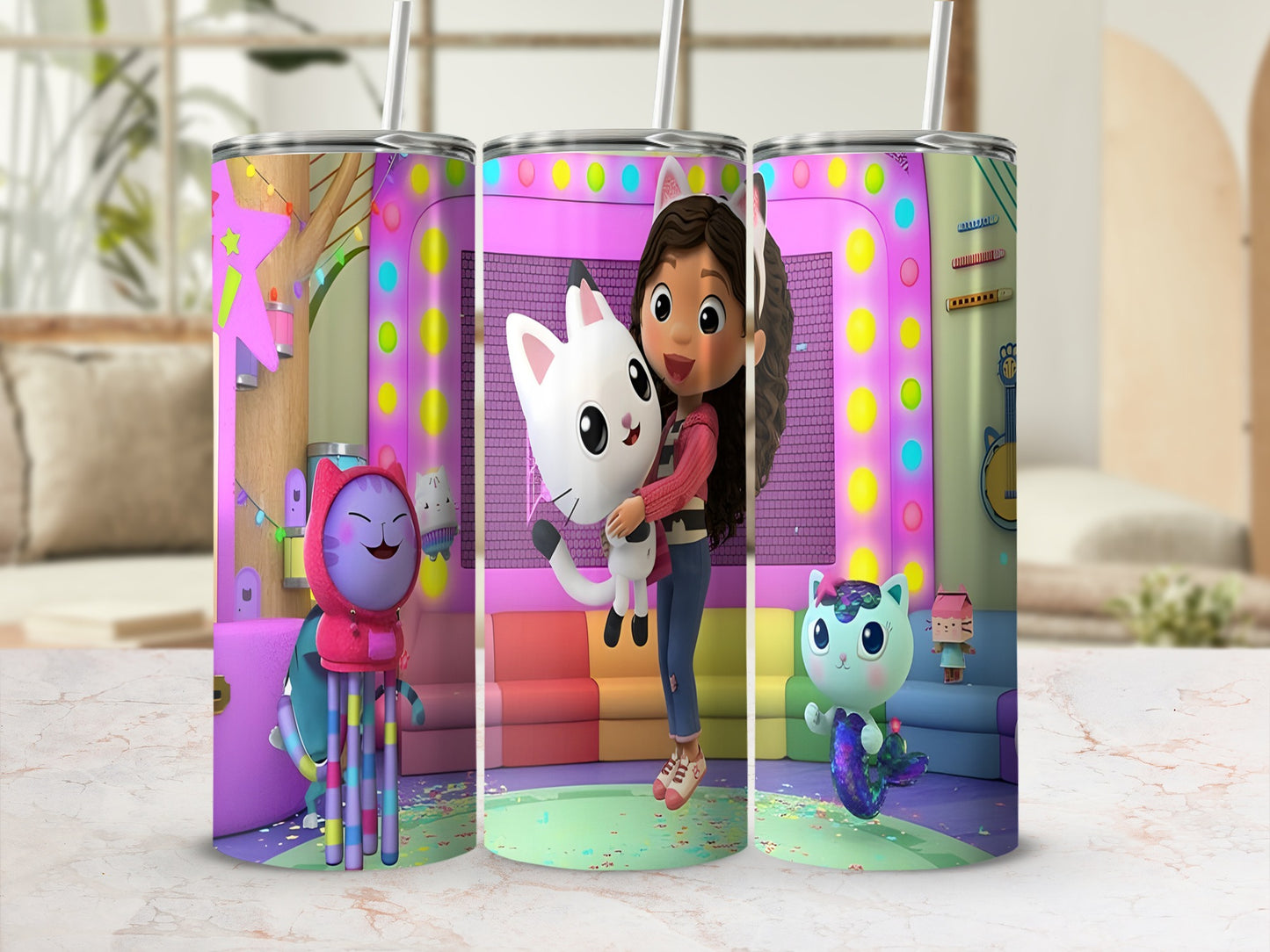 Gabby's Dollhouse characters Pandy Paws, DJ Catnip, and MerCat with colorful background.