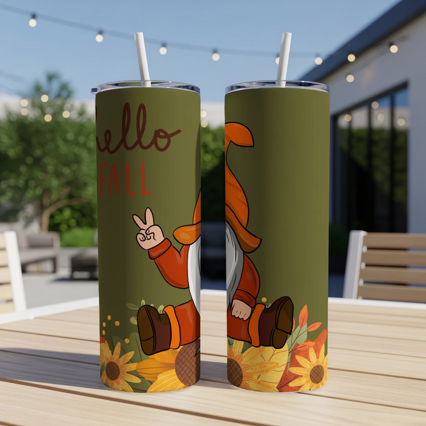 Two tumblers featuring a gnome with fall leaves and "Hello Fall" text.