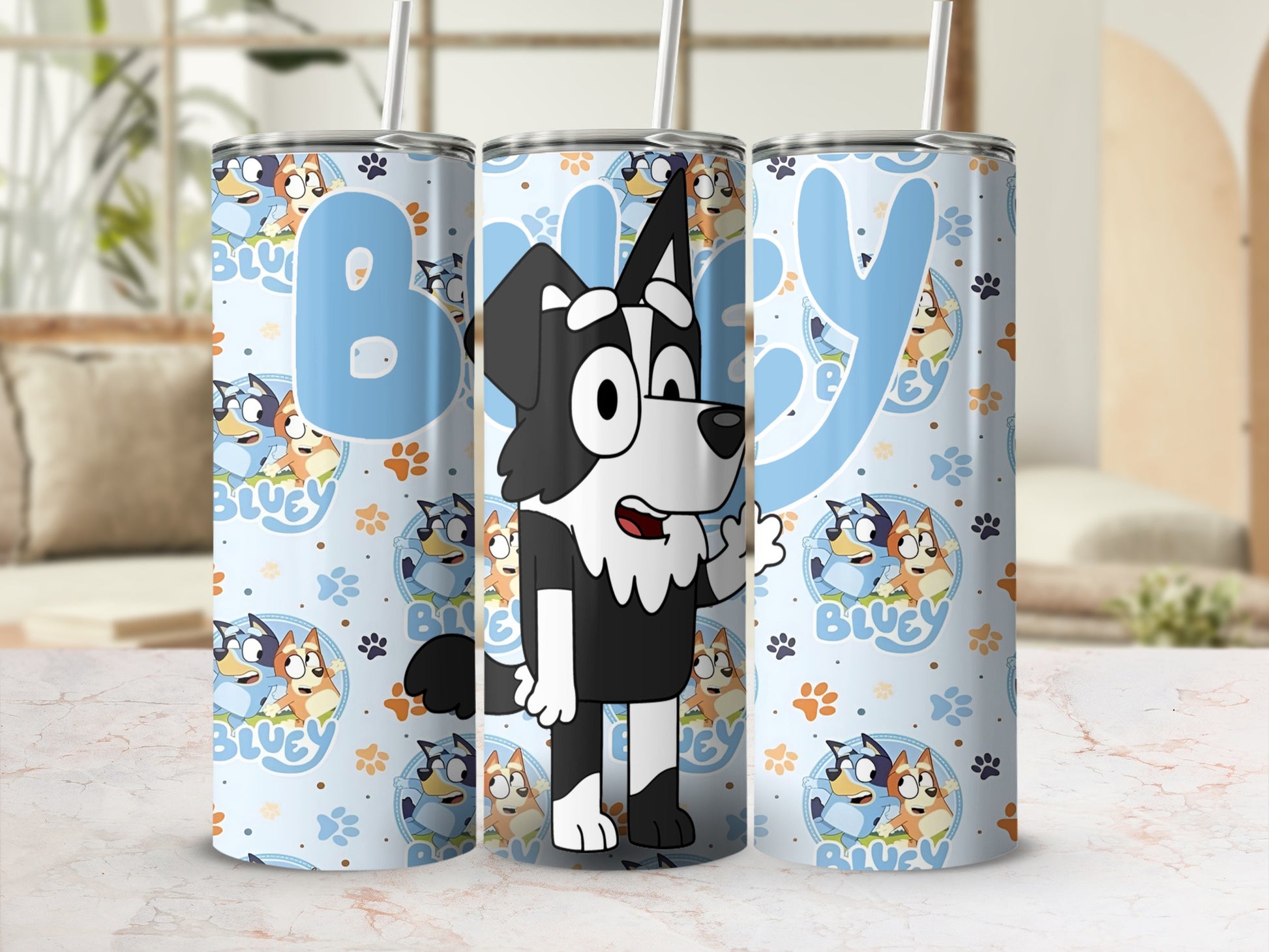 Bluey character tumbler with paw prints and "Bluey" text.