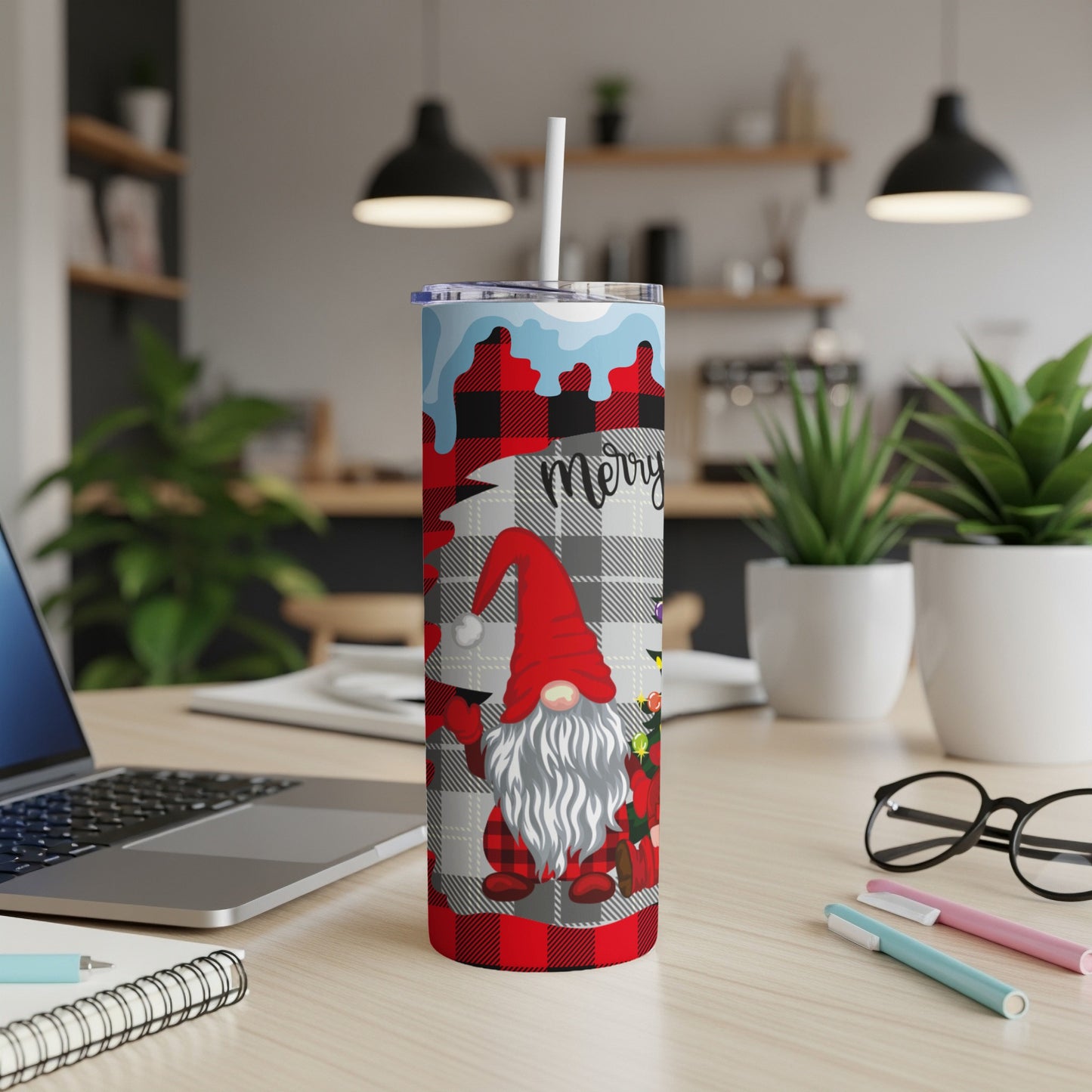 Gnome with Merry text on buffalo plaid tumbler with straw.