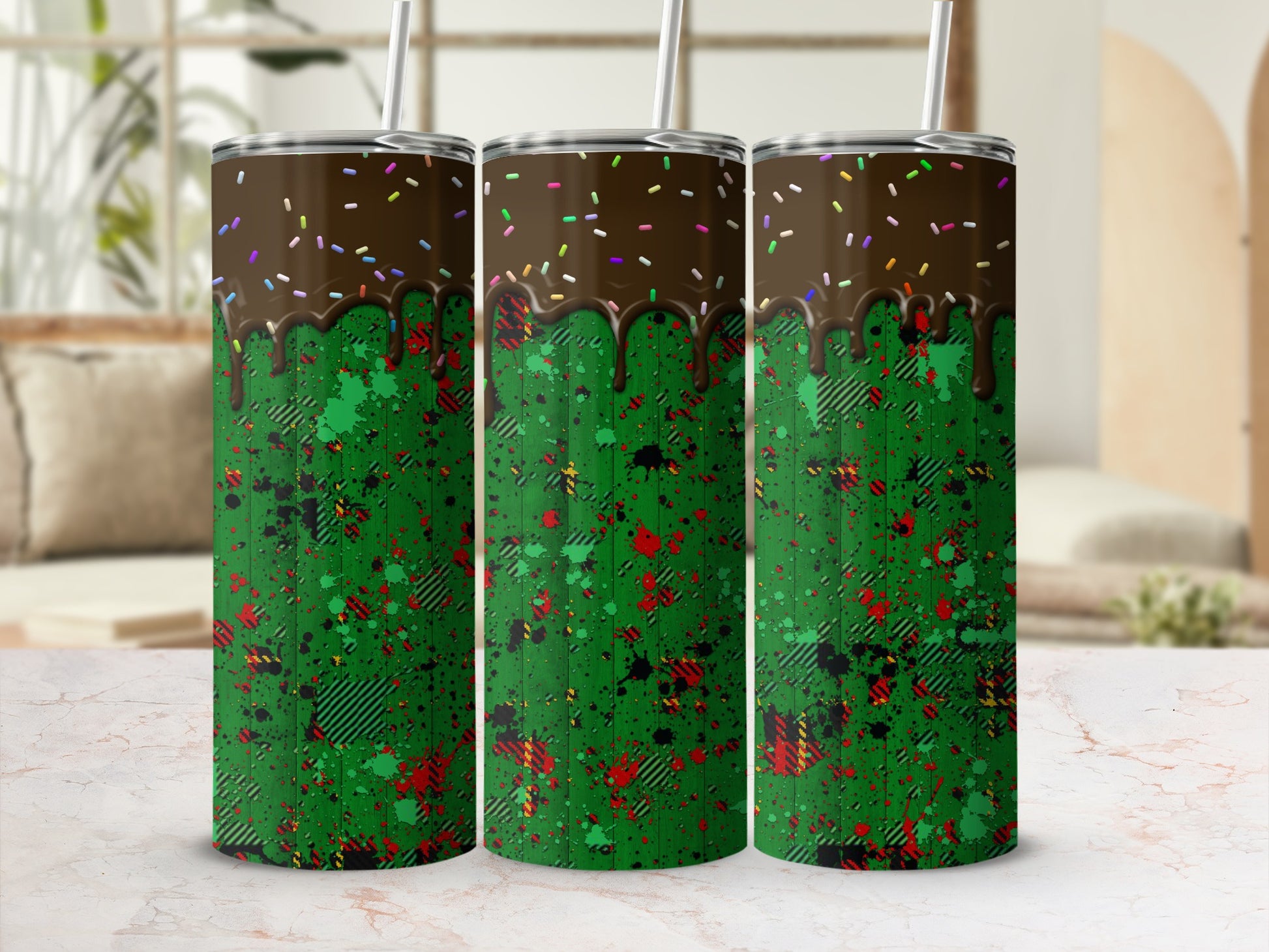 Green tumbler with chocolate drip and colorful sprinkles, plaid and splatter design.