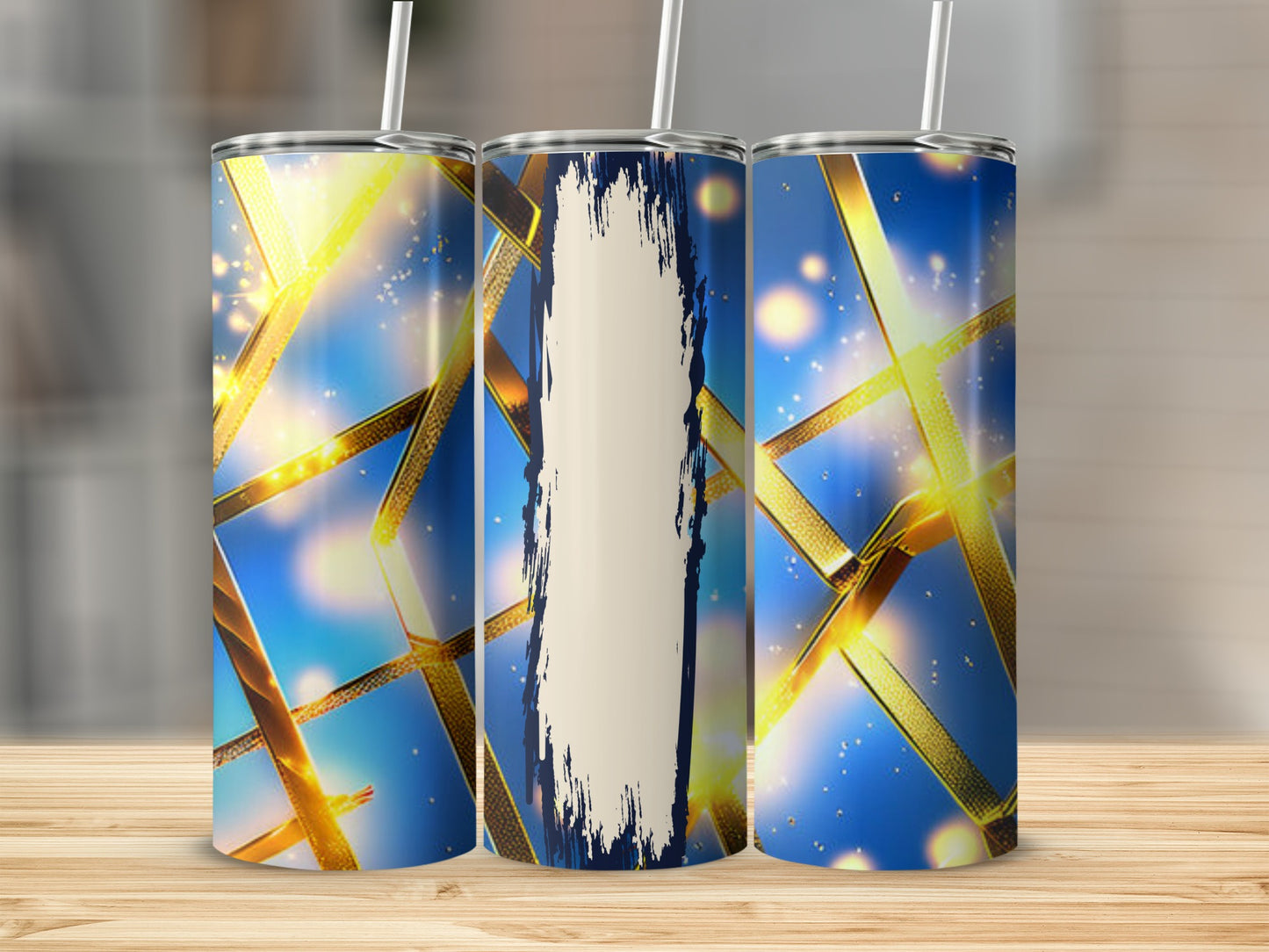 Three tumblers with blue and gold ribbon pattern and textured brush stroke.