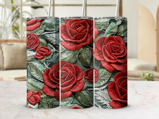 3D embroidered red roses and green leaves on a tumbler.