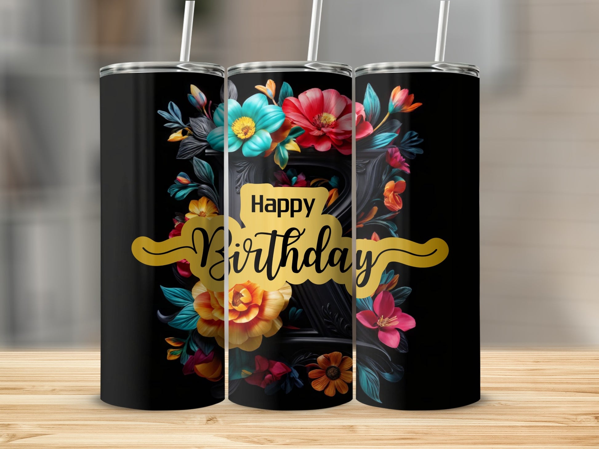 Black tumblers with floral design and "Happy Birthday" text.