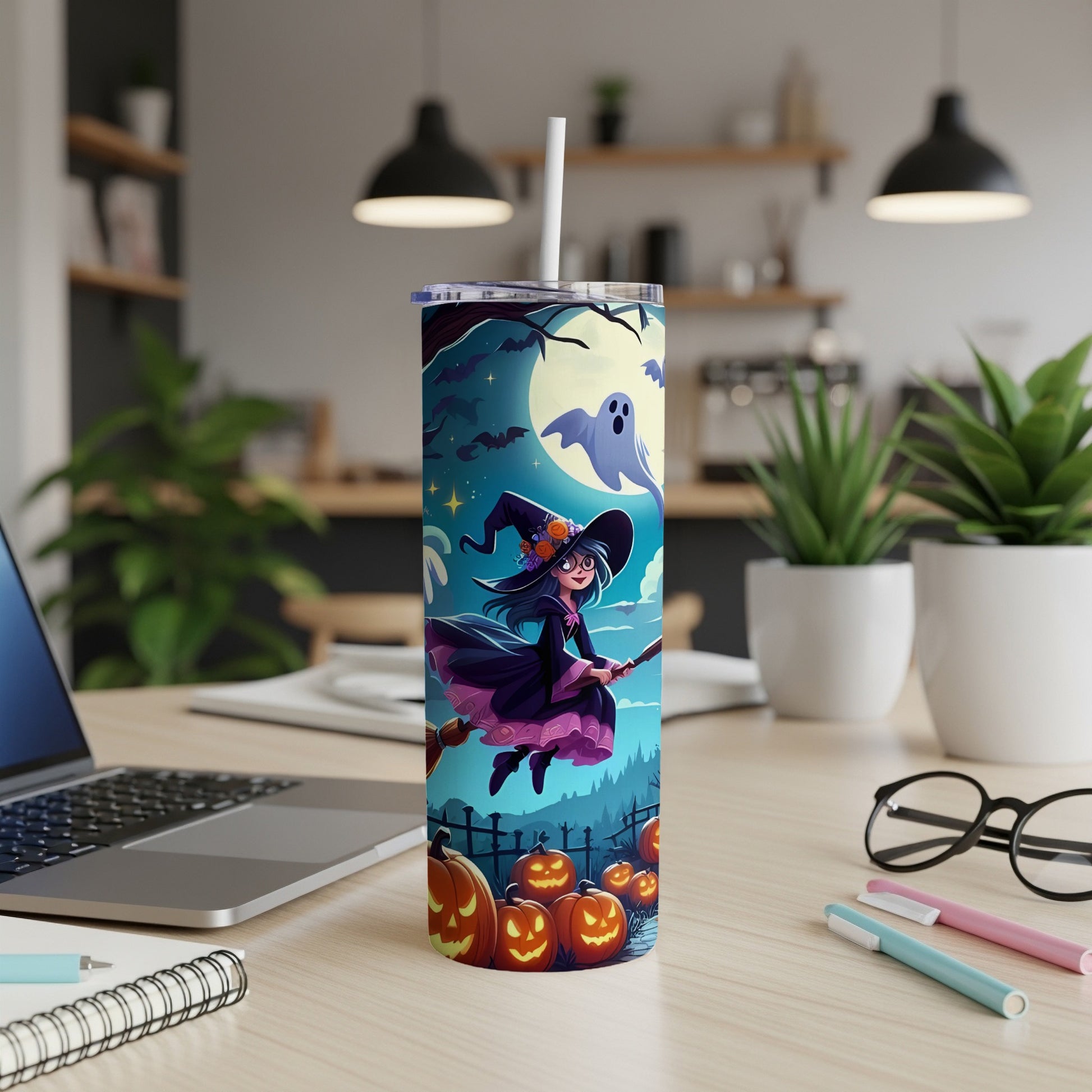 Halloween tumbler with witch, ghost, bats, moon, and pumpkins.