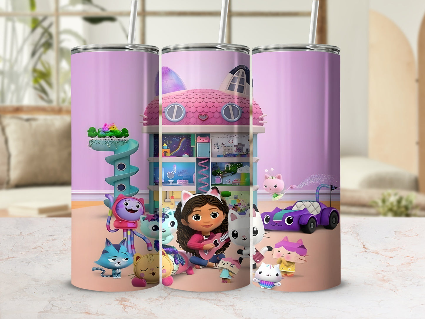 Gabby's Dollhouse characters and logo on a tall purple tumbler with a straw.