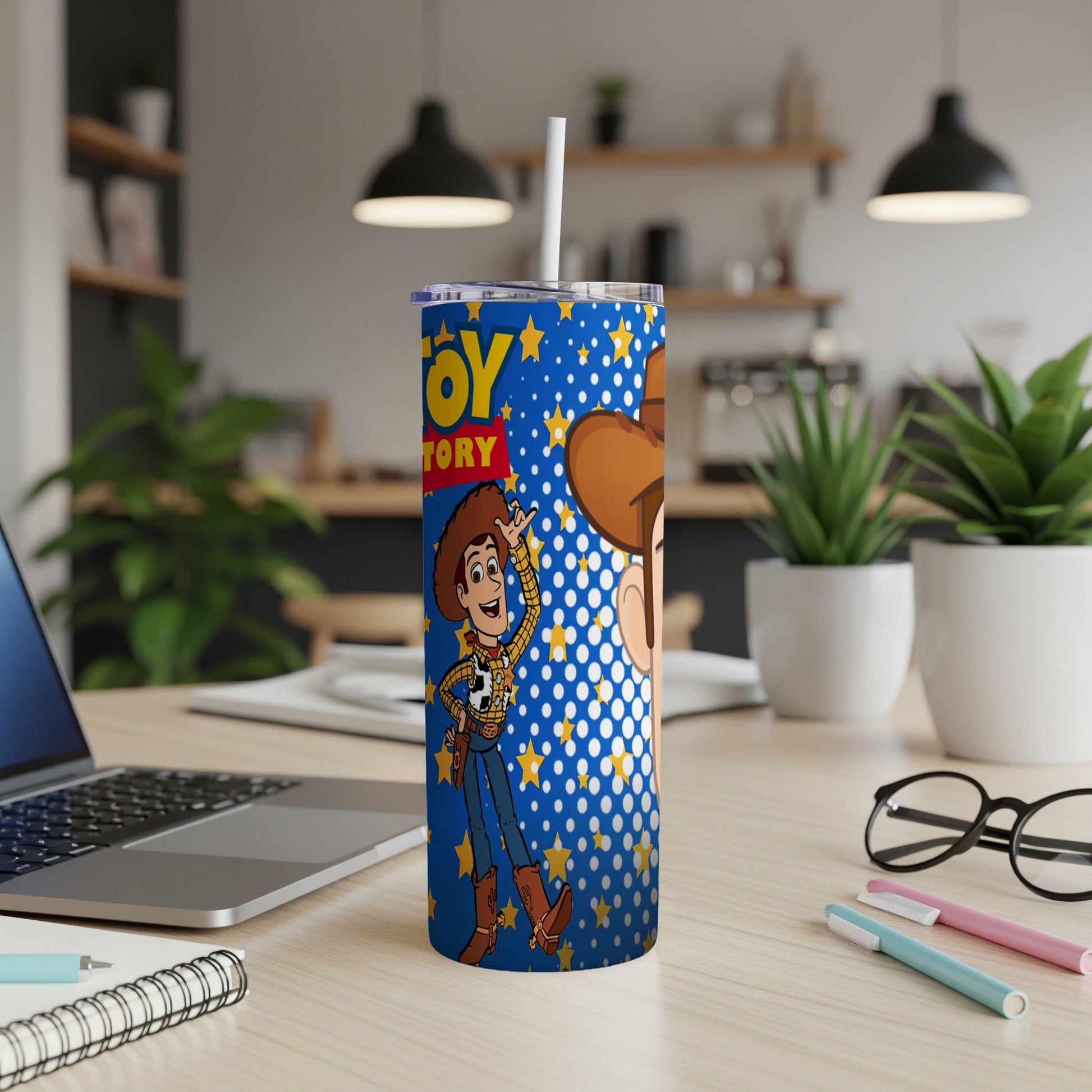 Woody from Toy Story on a blue tumbler with starburst pattern.