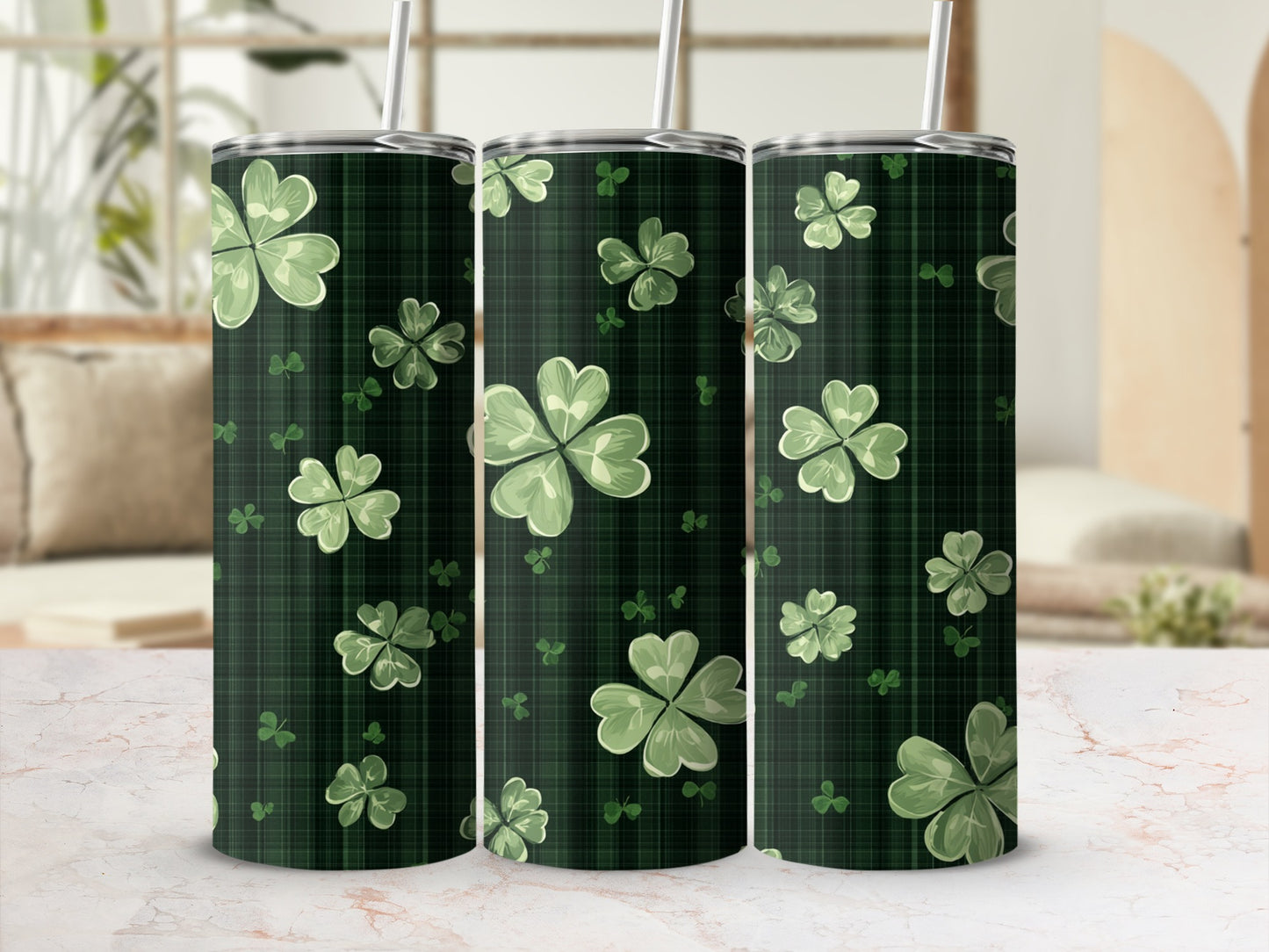Three green plaid tumblers with clover leaf pattern.