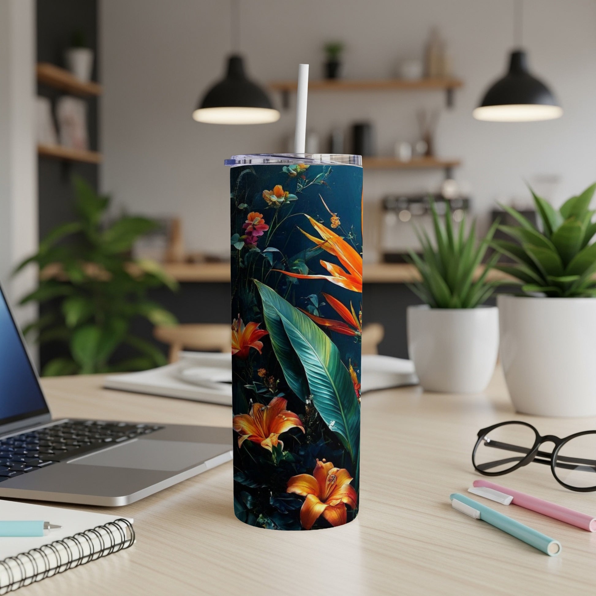 Tall dark tumbler with vibrant orange and pink tropical flowers.