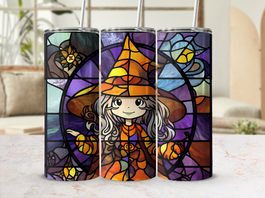 Stained glass tumbler with a cute witch wearing an orange hat.