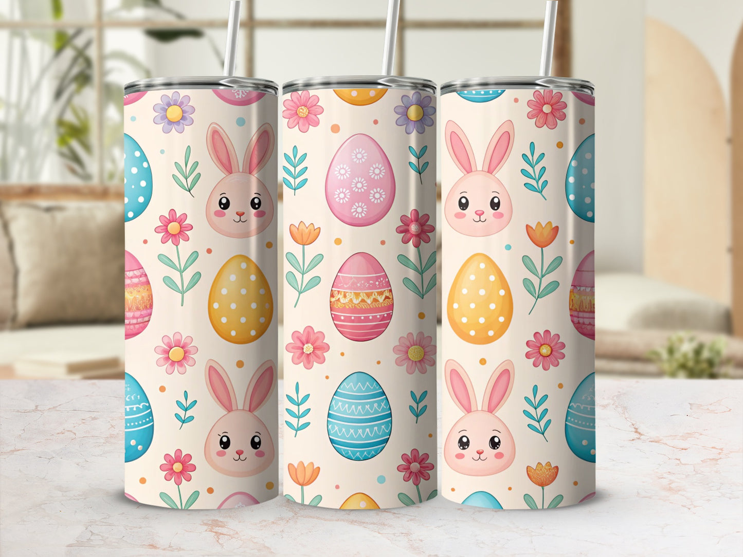 Three Easter-themed tumblers with bunnies, eggs, and flowers on a blurred background.