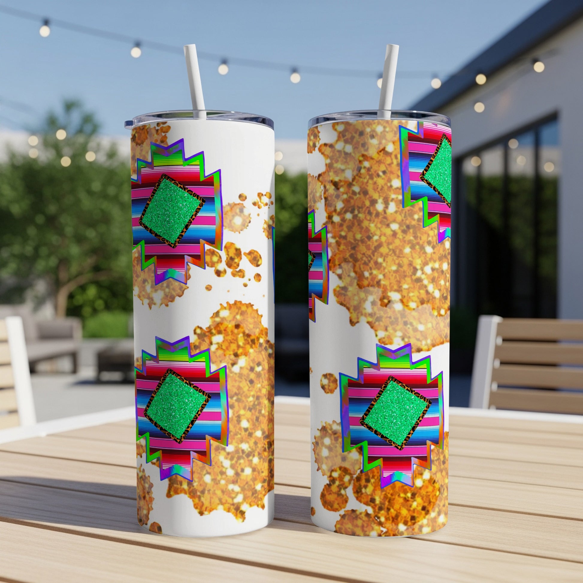 Two tumblers with a Southwestern blanket pattern and gold glitter accents.