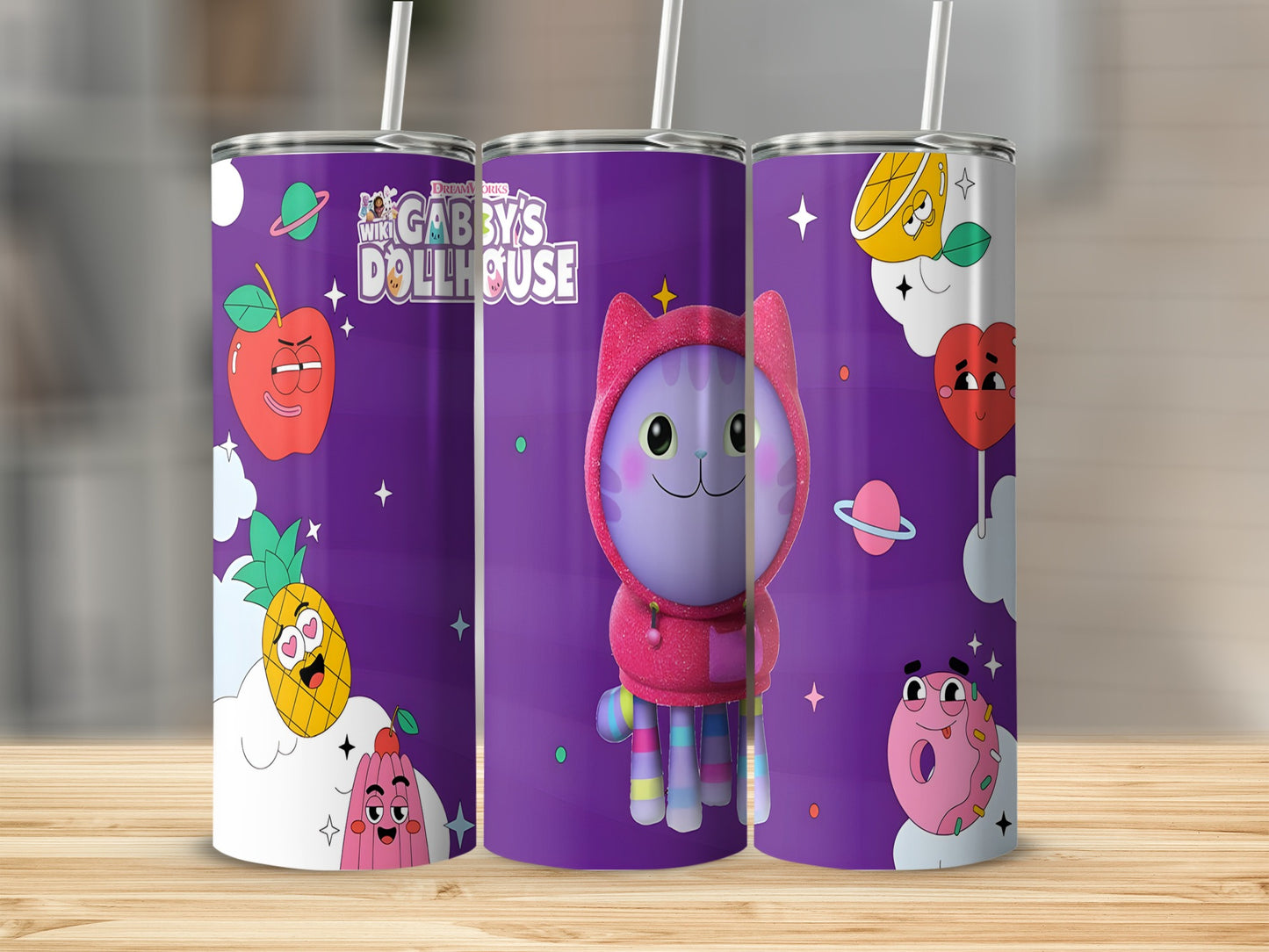 Gabby's Dollhouse themed tumbler with characters and colorful illustrations.