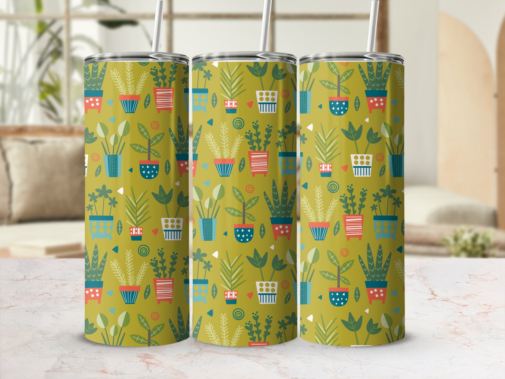 Three tumblers with a playful potted plant pattern on a yellow-green background.