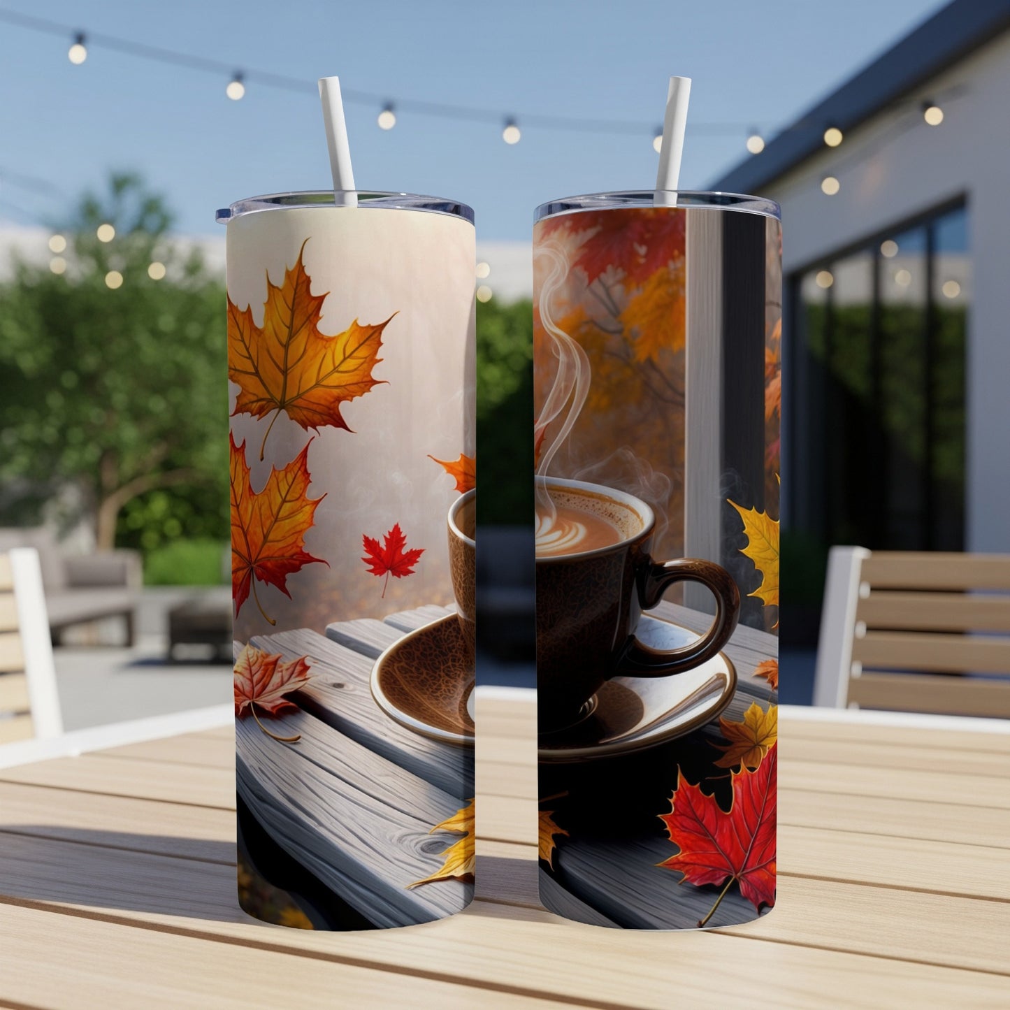 Two tumblers featuring autumn leaves and a steaming cup of coffee.