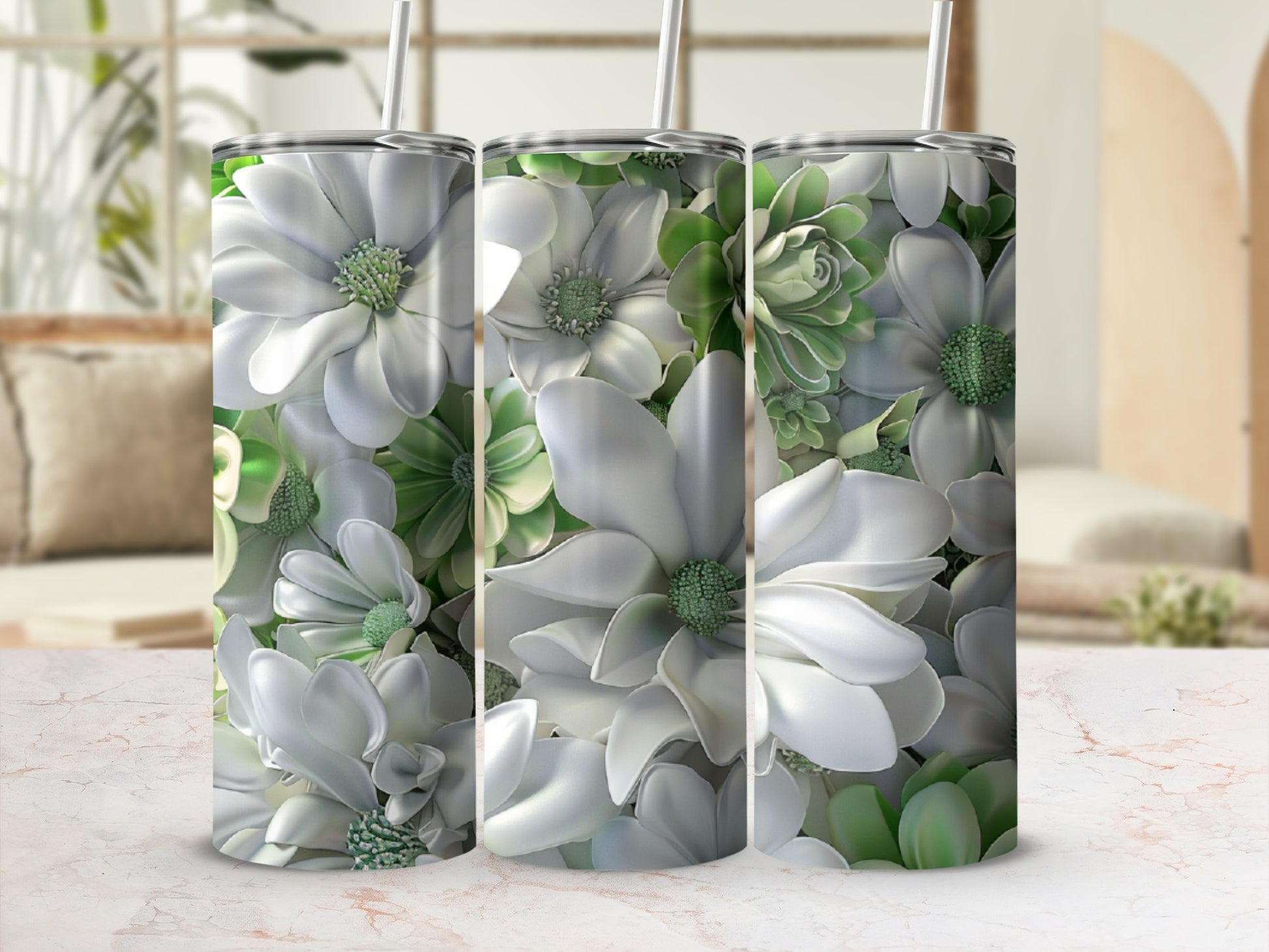 Triptych of tumblers featuring white and green floral and succulent designs.