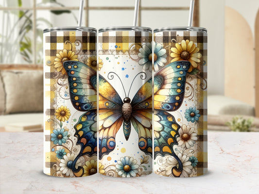 Three tumblers featuring a large colorful butterfly and floral accents on a plaid background.